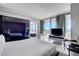 Open concept suite featuring soaking tub, bedroom, and city views at 4381 W Flamingo Rd # 1121, Las Vegas, NV 89103
