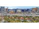 A picturesque view of the city skyline from above the treetops at 4381 W Flamingo Rd # 1206, Las Vegas, NV 89103
