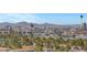 Stunning city view surrounded by lush greenery, blending urban sophistication with natural beauty at 4381 W Flamingo Rd # 1206, Las Vegas, NV 89103