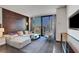Inviting living room featuring a comfortable sofa, modern decor, and expansive city views at 4381 W Flamingo Rd # 1206, Las Vegas, NV 89103