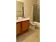 Functional bathroom featuring a single sink vanity, toilet, and shower-tub combination at 4555 E Sahara Ave # 122, Las Vegas, NV 89104