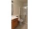 Well-lit bathroom features a toilet and glass shower door at 4555 E Sahara Ave # 122, Las Vegas, NV 89104