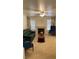 Cozy living room featuring a fireplace, traditional furnishings, and lots of natural light at 4555 E Sahara Ave # 122, Las Vegas, NV 89104