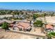 Discover a single-story home with a tile roof, surrounded by a fenced yard in a residential community with city views at 475 E Robindale Rd, Las Vegas, NV 89123