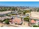 Aerial view showcasing the property, landscaping, city view, and proximity to Las Vegas at 475 E Robindale Rd, Las Vegas, NV 89123