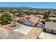This property features a two-car garage and desert landscaping set within a residential neighborhood with mountain views at 475 E Robindale Rd, Las Vegas, NV 89123