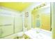 Bathroom featuring a shower-tub combo and a large mirror at 475 E Robindale Rd, Las Vegas, NV 89123