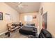 Bedroom featuring a ceiling fan, and dark color furniture at 475 E Robindale Rd, Las Vegas, NV 89123