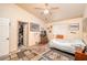 Bedroom featuring a ceiling fan, and closet at 475 E Robindale Rd, Las Vegas, NV 89123