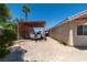 View of covered carport from the rear of the home at 475 E Robindale Rd, Las Vegas, NV 89123