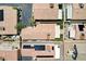 A birdseye view of well maintained backyards with covered patios at 5043 Mascaro Dr, Las Vegas, NV 89122