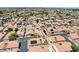 An aerial view of a well maintained community with a desert landscape and clear blue sky at 5043 Mascaro Dr, Las Vegas, NV 89122
