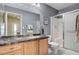 Bathroom view features granite counters, walk-in shower and tile floors at 5043 Mascaro Dr, Las Vegas, NV 89122