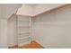 Walk-in closet features wood floors and shelving at 5043 Mascaro Dr, Las Vegas, NV 89122