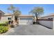 Charming single-story home with desert landscaping, and a well-maintained front yard at 5043 Mascaro Dr, Las Vegas, NV 89122