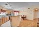 Spacious kitchen with granite countertops, stainless appliances, and hardwood floors at 5043 Mascaro Dr, Las Vegas, NV 89122