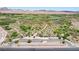 Overhead view of a park with a parking lot, walking paths, picnic spots, vegetation, and desert mountains at 5043 Mascaro Dr, Las Vegas, NV 89122