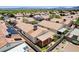 A back yard featuring a covered patio, with rock landscaping and well-kept lawn at 5043 Mascaro Dr, Las Vegas, NV 89122