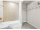 Remodeled bathroom featuring a shower-tub combo, closet, and modern fixtures at 5191 Caliente St # 84, Las Vegas, NV 89119