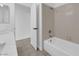 Tiled shower/tub combination in this well lit bathroom at 5437 Escallonia St, Las Vegas, NV 89149
