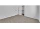 Bedroom featuring carpeted floor, light gray walls, and a closet at 5437 Escallonia St, Las Vegas, NV 89149