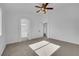 Bedroom with carpet, a ceiling fan, and an ensuite bathroom at 5437 Escallonia St, Las Vegas, NV 89149
