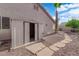Backyard storage shed with pathway and desert landscaping at 5437 Escallonia St, Las Vegas, NV 89149