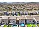 Aerial view of the neighborhood showing the homes and backyard landscaping and amenities at 5904 Becklow Gardens Ave, Las Vegas, NV 89141
