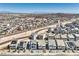 Expansive aerial view of a well-planned community with modern homes and scenic mountain views at 5904 Becklow Gardens Ave, Las Vegas, NV 89141