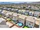 Aerial view of the community showcasing the rows of new homes with modern architecture and desert landscaping at 5904 Becklow Gardens Ave, Las Vegas, NV 89141