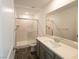 Contemporary bathroom featuring a walk-in shower, toilet, and vanity at 5904 Becklow Gardens Ave, Las Vegas, NV 89141