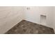Functional laundry room featuring tile floors and wire shelving at 5904 Becklow Gardens Ave, Las Vegas, NV 89141