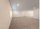 Spacious living area featuring plush carpeting, recessed lighting and easy access to other rooms at 5904 Becklow Gardens Ave, Las Vegas, NV 89141