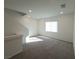 Spacious loft with recessed lighting and natural light from the window at 5904 Becklow Gardens Ave, Las Vegas, NV 89141