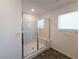 Glass enclosed walk-in shower with bench, tile surround, and chrome hardware at 5904 Becklow Gardens Ave, Las Vegas, NV 89141