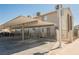 Covered parking area with assigned spaces and convenient access to condo units with gated fences at 595 Sellers Pl, Henderson, NV 89011