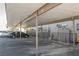 Apartment parking area with covered parking spaces at 595 Sellers Pl, Henderson, NV 89011
