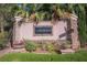 Welcome to Caparola; a beautiful community entrance with stone signage and colorful landscaping at 6029 Allanche Ave, Las Vegas, NV 89141