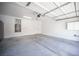 Spacious two-car garage with water heater, ample room for storage and organization at 6029 Allanche Ave, Las Vegas, NV 89141