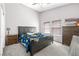 Comfortable bedroom with neutral walls, carpeted floor, window blinds, and classic furniture at 6050 Golden Corral Trl # 102, Henderson, NV 89011