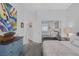 Bedroom features sliding mirrored closet doors and warm neutral decor at 6173 Sabine Ranch Rd, Las Vegas, NV 89131
