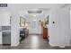 Bright foyer featuring elegant tile flooring, recessed lighting, and a decorative front door at 6173 Sabine Ranch Rd, Las Vegas, NV 89131