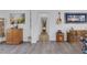 Bright living room showcasing decorative furniture and decor including an acoustic guitar hanging on the wall at 6173 Sabine Ranch Rd, Las Vegas, NV 89131