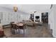 Bright, open-concept living space with sleek floors, recessed lighting, and an electric fireplace at 6173 Sabine Ranch Rd, Las Vegas, NV 89131