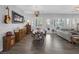 Spacious living area featuring modern decor, natural light, and tile floors, perfect for relaxation at 6173 Sabine Ranch Rd, Las Vegas, NV 89131