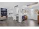 Inviting living space featuring an open floor plan, modern flooring, and access to the front entry at 6173 Sabine Ranch Rd, Las Vegas, NV 89131