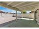 Inviting backyard with a covered patio and low maintenance rock landscaping at 6204 Robin Hood Cir, Las Vegas, NV 89108