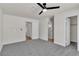 Spacious bedroom with neutral decor and multiple doorways for flexible access to other rooms at 6204 Robin Hood Cir, Las Vegas, NV 89108