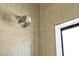 This walk-in shower features a contemporary shower head and neutral tones at 6204 Robin Hood Cir, Las Vegas, NV 89108