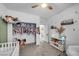 Charming bedroom with closet storage and a view into laundry area and stylish decor at 6318 Amber Sunrise St, North Las Vegas, NV 89031